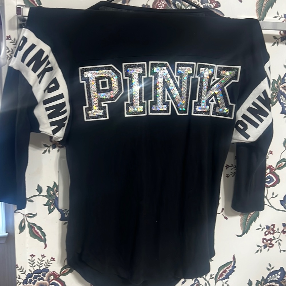 Used black shirt in good condition,brand pink size small